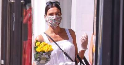 Christine Lampard stuns in summery white dress and sandals as she wears floral face mask on London outing - www.ok.co.uk - London
