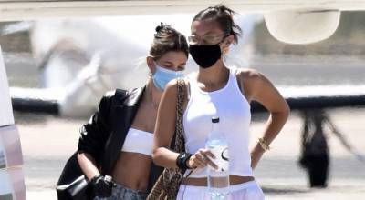 Hailey Bieber & Bella Hadid Wear Masks While Leaving Sardinia After 3-Day Photo Shoot - www.justjared.com - Italy
