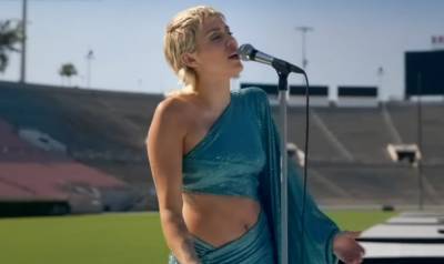 Miley Cyrus Sings The Beatles' 'Help' in an Empty Football Stadium - Watch Now! - www.justjared.com