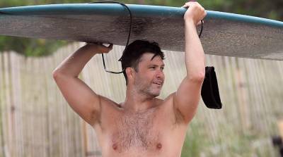 SNL's Colin Jost Goes Shirtless While Surfing in the Hamptons! - www.justjared.com - New York - county Hampton