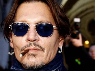 Johnny Depp breached order in U.K. libel case by not disclosing 'drug texts' - canoe.com - Britain