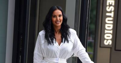 Maya Jama flaunts incredible legs in gorgeous white shirt dress and snakeskin boots as star leaves work - www.ok.co.uk - London