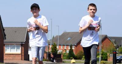 Cambuslang boys raise over £3k for charity after completing run challenge - www.dailyrecord.co.uk