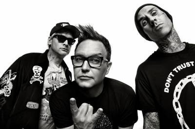 Blink-182 Is Celebrating the 182nd Day of the Year With Special 'Dogs Eating Dogs' Merch - www.billboard.com