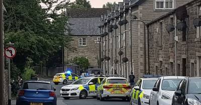'Gang in balaclavas' storm house before police evacuate residents from their homes - www.manchestereveningnews.co.uk - Manchester