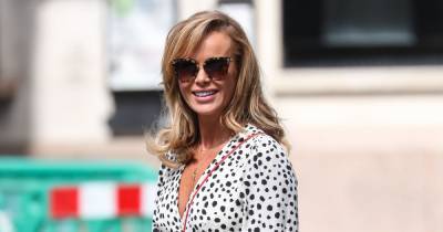 Amanda Holden bounces back from wardrobe malfunction as she confidently struts in chic spotted dress - www.ok.co.uk - Britain