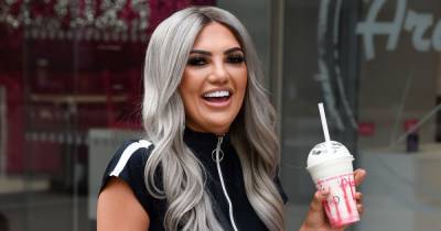 Geordie Shore star Abbie Holborn shows off toned midriff as she tucks into burger and milkshake - www.ok.co.uk - Manchester