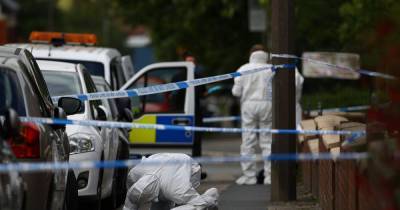 CSI pictured combing the scene after reports boy stabbed in Bolton house - www.manchestereveningnews.co.uk - Manchester