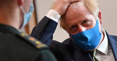 Boris Johnson says people 'should wear face coverings in shops' with government announcement in days - www.manchestereveningnews.co.uk