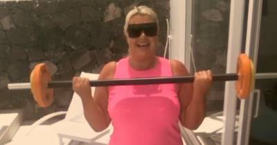 Gemma Collins continues weight loss journey on Marbella holiday by lifting weights in pink gym gear - www.ok.co.uk - Spain