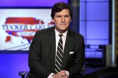 Tucker Carlson Announces Vacation After Writer Departs Following Racist Posts - www.tvguide.com
