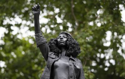 Statue of Black Lives Matter protestor removed from Bristol’s empty Edward Colston plinth - www.nme.com - city Bristol