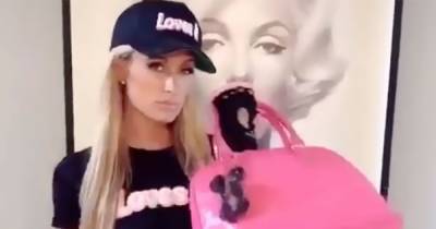 Forget Weights! Paris Hilton Gets Her Sweat on With the Help of Louis Vuitton Bags: Watch - www.usmagazine.com