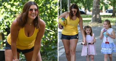 Big Brother's Imogen Thomas shows off her curves as star enjoys fun trip to park with her daughters - www.ok.co.uk