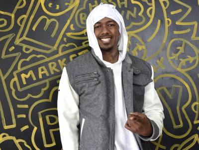 Nick Cannon takes time off from radio show, stays with 'Masked Singer' - canoe.com - Los Angeles - county Cannon