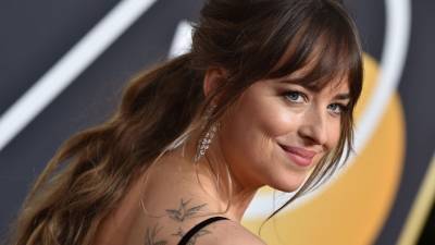 Dakota Johnson’s Dating History Might Just Confirm the Theory that She Came Out as Bisexual - stylecaster.com