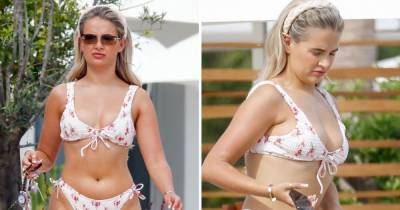 Molly-Mae Hague looks incredible in floral bikini on holiday with Tommy Fury as she fires back at cruel troll comments calling her ‘lardy’ - www.ok.co.uk - Hague