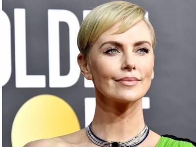 'YES! WHEN AND WHERE?': Charlize Theron wants to step into WWE ring - canoe.com - city Kingston