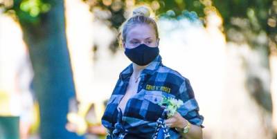 Pregnant Sophie Turner Stunned in a Skintight Unitard and Plaid Shirt - www.marieclaire.com - Los Angeles