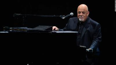 Billy Joel playing a discarded piano is the happy we need right now - edition.cnn.com - New York - county Long