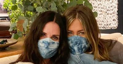 Masked Courteney Cox Cuddles With Jennifer Aniston and Her Dogs in Sweet Video - www.usmagazine.com - city Cougar