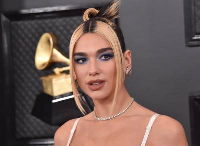 Dua Lipa Opens Up About The ‘Growing Pains’ Of Being A Woman - etcanada.com - Britain