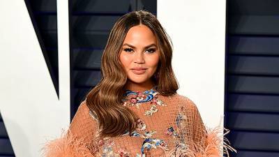 Chrissy Teigen Claps Back At Trolls Who Think She Didn’t Get Her Breast Implants Removed: ‘These Are The Scars’ - hollywoodlife.com