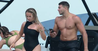 Molly-Mae Hague shows off incredible figure in stylish black swimsuit on yacht in Ibiza with Tommy Fury - www.ok.co.uk - Hague
