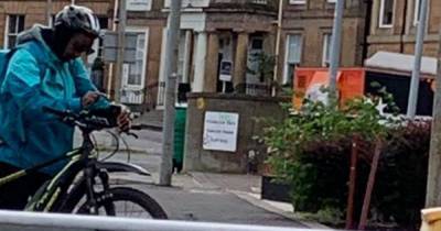 Deliveroo cyclist spits on shocked Glasgow couple's car window after city centre road rage rammy - www.dailyrecord.co.uk - Scotland
