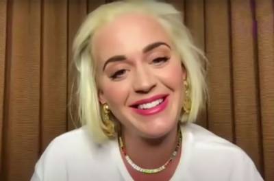 Katy Perry Shows Off Growing Baby Bump in 'Smile' Crop Top During Interview - www.billboard.com - Australia