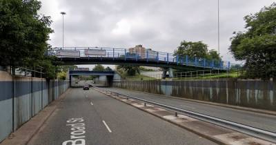 Driver found 29-year-old man dead in road after he 'jumped or fell' from bridge over A6 in Salford - www.manchestereveningnews.co.uk