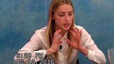 Amber Heard says she tried to protect Johnny Depp after he was allegedly violent - www.breakingnews.ie - Los Angeles