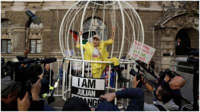 Vivienne Westwood Stages Birdcage Protest to Support Julian Assange - variety.com - London