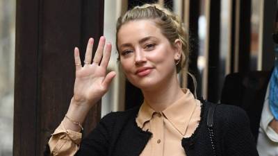 Amber Heard claims Johnny Depp threw bottles at her ‘like grenades’ - www.breakingnews.ie - Australia