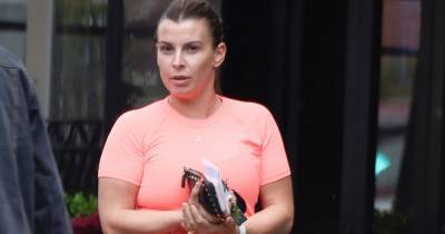 Coleen Rooney appears pensive as she steps out on her own after recent backlash - www.ok.co.uk