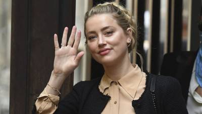 Amber Heard Alleges Johnny Depp Headbutted Her the Night Before She Appeared on James Corden Show - variety.com
