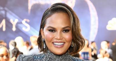 Chrissy Teigen Admits She Might Have Another Breast Reduction Surgery: ‘They’re Still Huge’ - www.usmagazine.com