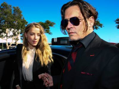 Johnny Depp's lawyers claim video shows Amber Heard was violent towards her sister - canoe.com - Britain