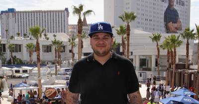 Rob Kardashian shares topless snap which showcases his impressive weight loss after announcing he's 'back baby' - www.ok.co.uk
