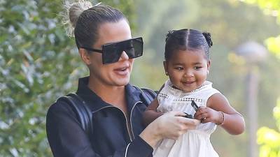 Khloe Kardashian’s Daughter True, 2, Picks Flowers In The Cutest Pink Dress — Watch - hollywoodlife.com