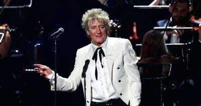 Sir Rod Stewart reveals he needed a bottle of wine to write his early hits - www.msn.com