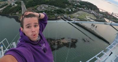 Teenage daredevil scales iconic Forth Road Bridge then gets nicked by police - www.dailyrecord.co.uk