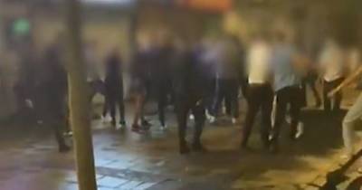 Huge scrap in the street caught on camera - '20 to 30' people kicked off outside a takeaway - www.manchestereveningnews.co.uk - Manchester