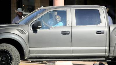 Kanye West Is All Smiles While Driving Around Wyoming After Hospital Visit Apology To Kim - hollywoodlife.com - Wyoming - city Cody, state Wyoming