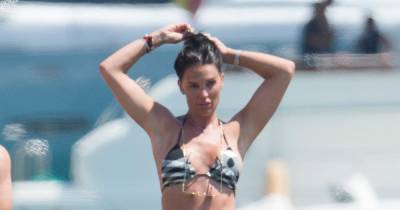 Danielle Lloyd shows off her toned figure in a tiny monochrome bikini as she soaks up the sun in Ibiza - www.ok.co.uk - Britain - Spain