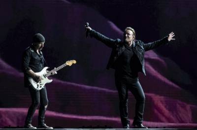 Watch U2's Bono and The Edge Play a Led Zeppelin Classic to Benefit Their Road Crew - www.billboard.com - Ireland