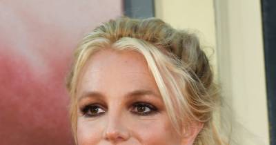Britney Spears says she's 'demanding attention' with full-body henna bikini photos - www.wonderwall.com