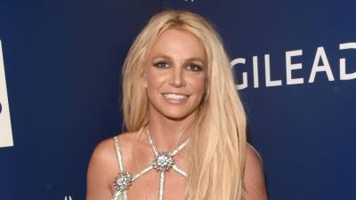 Britney Spears says she’s ‘demanding attention' in new bikini pic with henna tattoos - www.foxnews.com