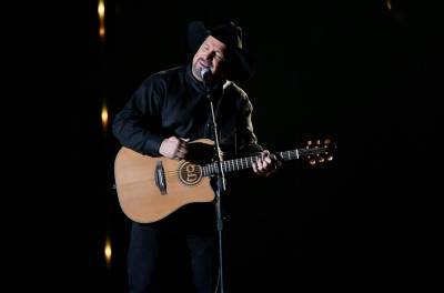 Why Garth Brooks Is Removing Himself From Contention for CMA Awards Entertainer of the Year - www.billboard.com