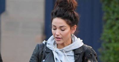Michelle Keegan looks casual in a hoodie and leather jacket as she walks dog after returning from Spanish holiday - www.ok.co.uk - Spain - county Cheshire